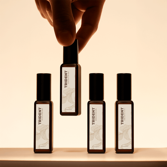 Trident perfumes 20 ML bottles for build your own 4 pack. A hand picking bottles